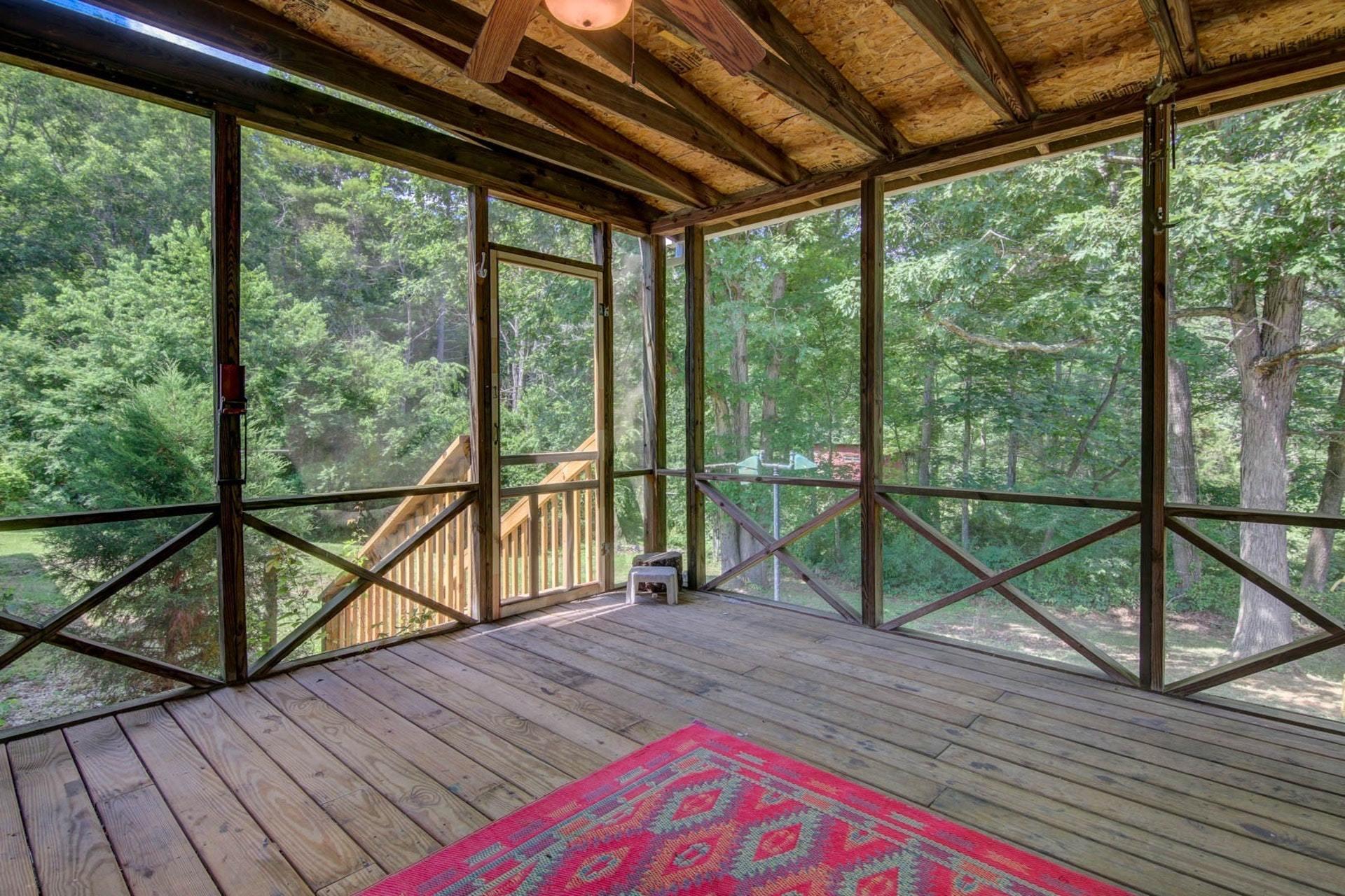 580 Mt Pleasant Church Road Fincastle, VA 24090 - Photo 27 of 39 a view of a balcony with wooden floor