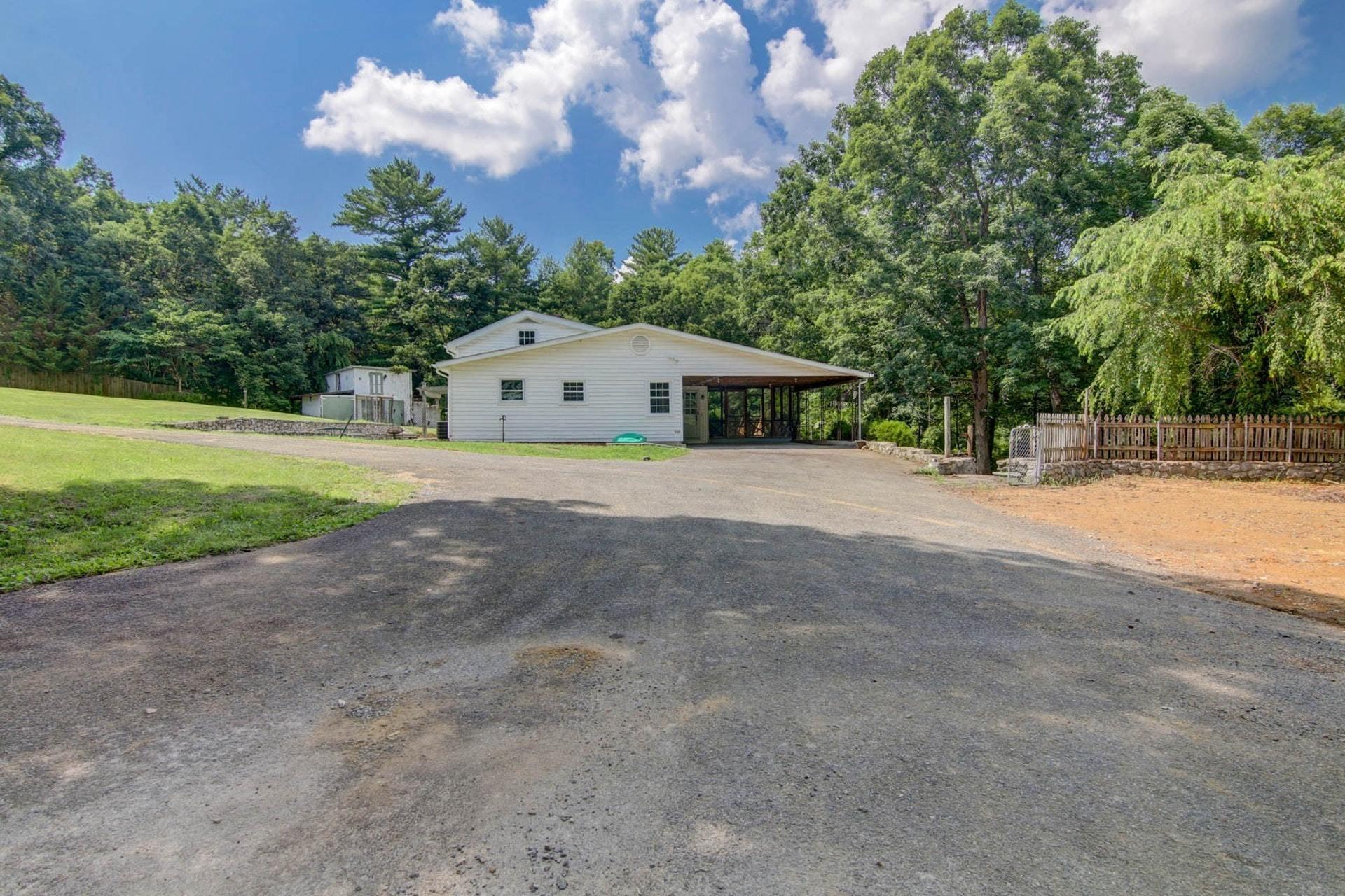 580 Mt Pleasant Church Road Fincastle, VA 24090 - Photo 36 of 39 a front view of a house with a yard and trees
