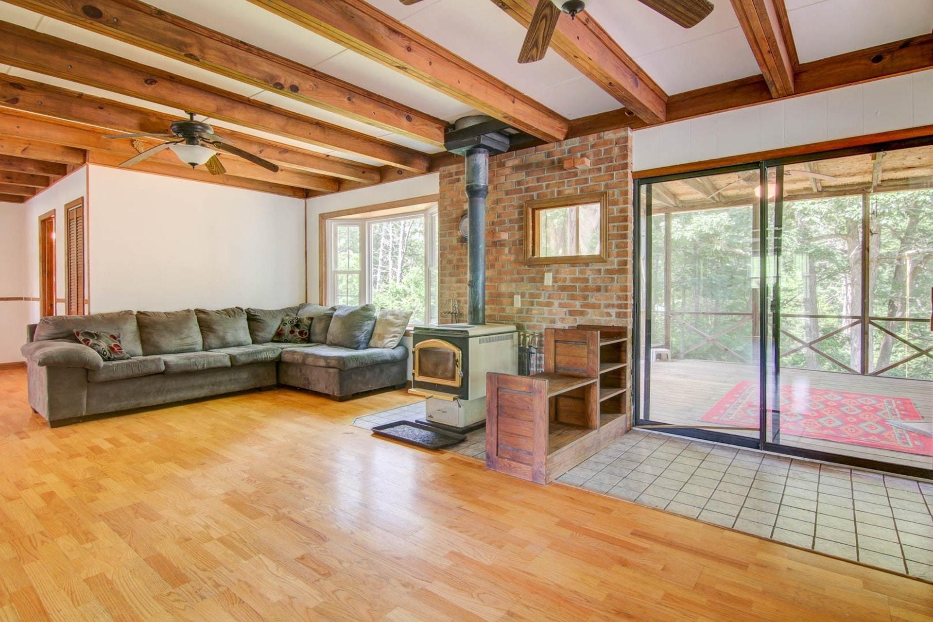 580 Mt Pleasant Church Road Fincastle, VA 24090 - Photo 9 of 39 a living room with furniture large window and wooden floor