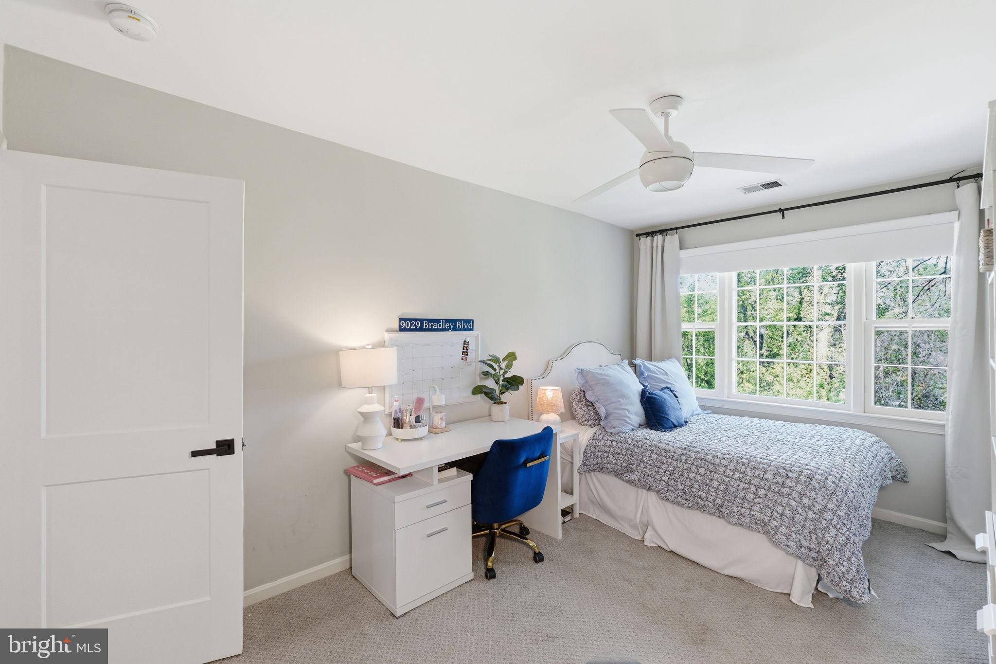 3523 Hamlet Place, Unit 501 Chevy Chase, MD 20815 - Photo 25 of 37 a bedroom with a bed and wooden floor