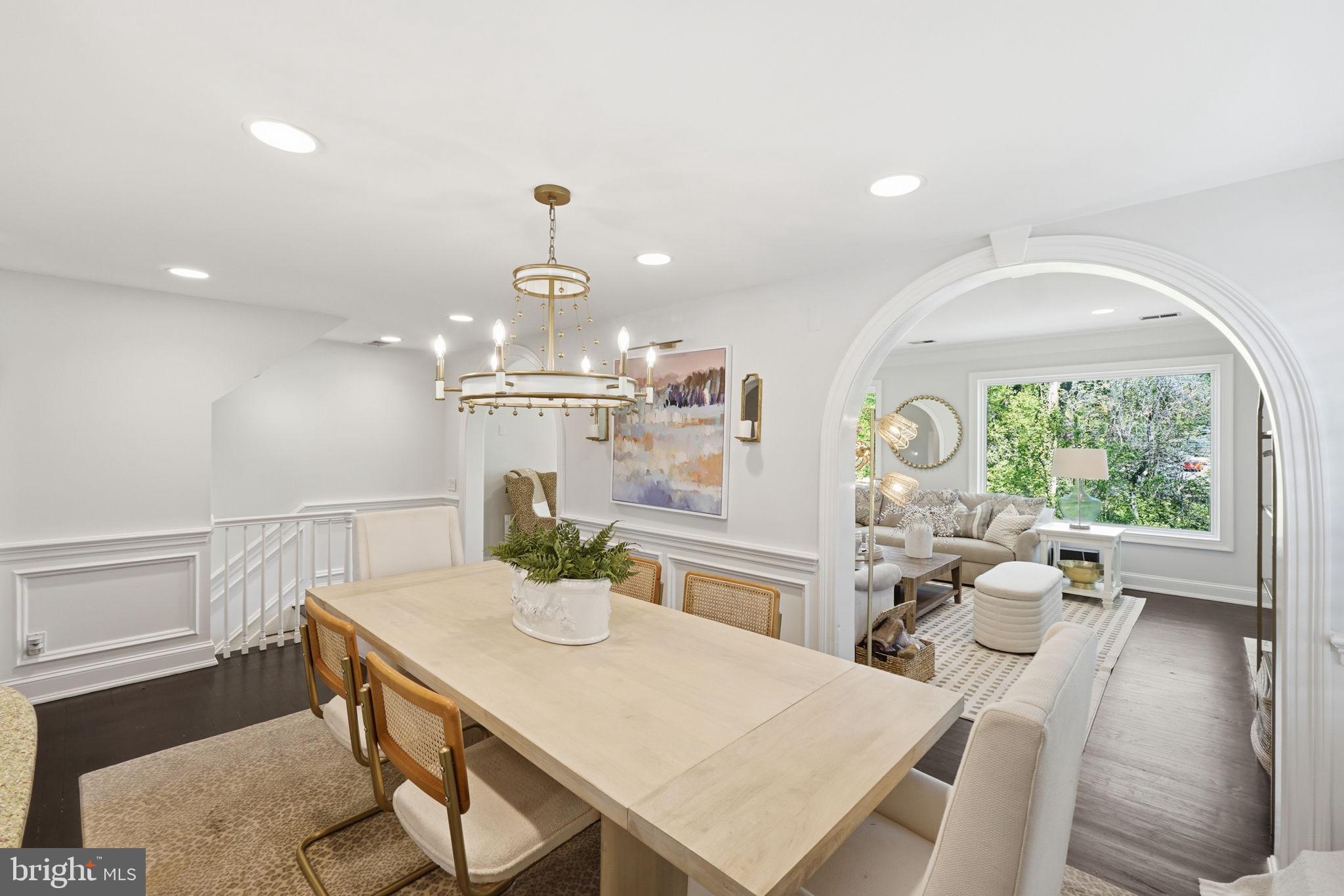 3523 Hamlet Place, Unit 501 Chevy Chase, MD 20815 - Photo 6 of 37 a view of a dining room with furniture window and outside view