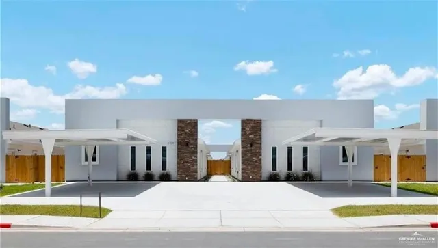 a view of a building with a swimming pool