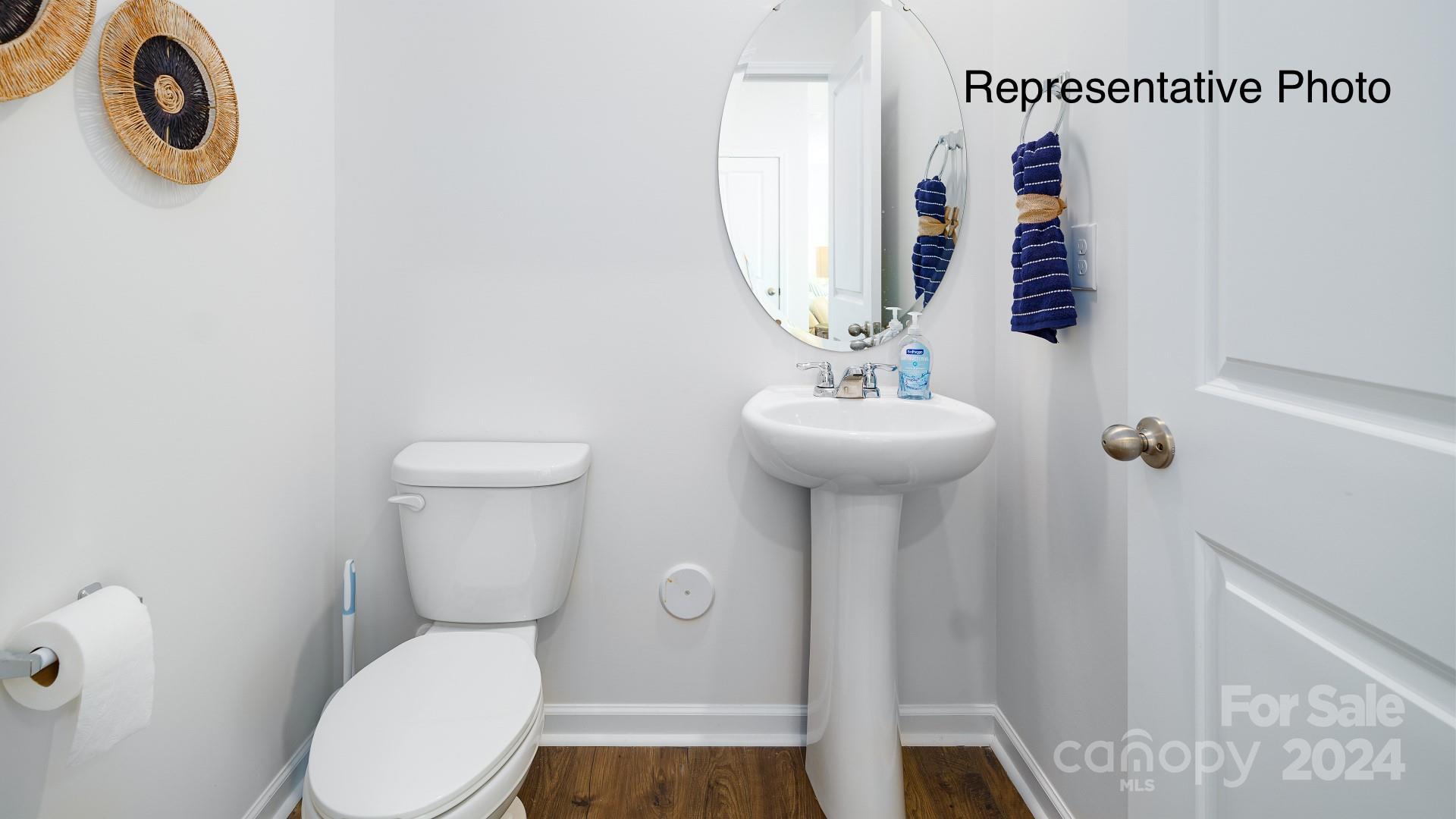 7922 Old Brk Road Sherrills Ford, NC 28673 - Photo 13 of 32 a bathroom with a toilet sink and mirror