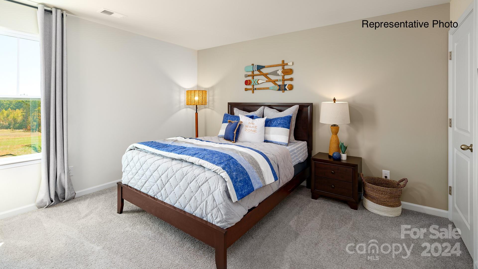 7922 Old Brk Road Sherrills Ford, NC 28673 - Photo 20 of 32 a bedroom with a bed and painting on the wall