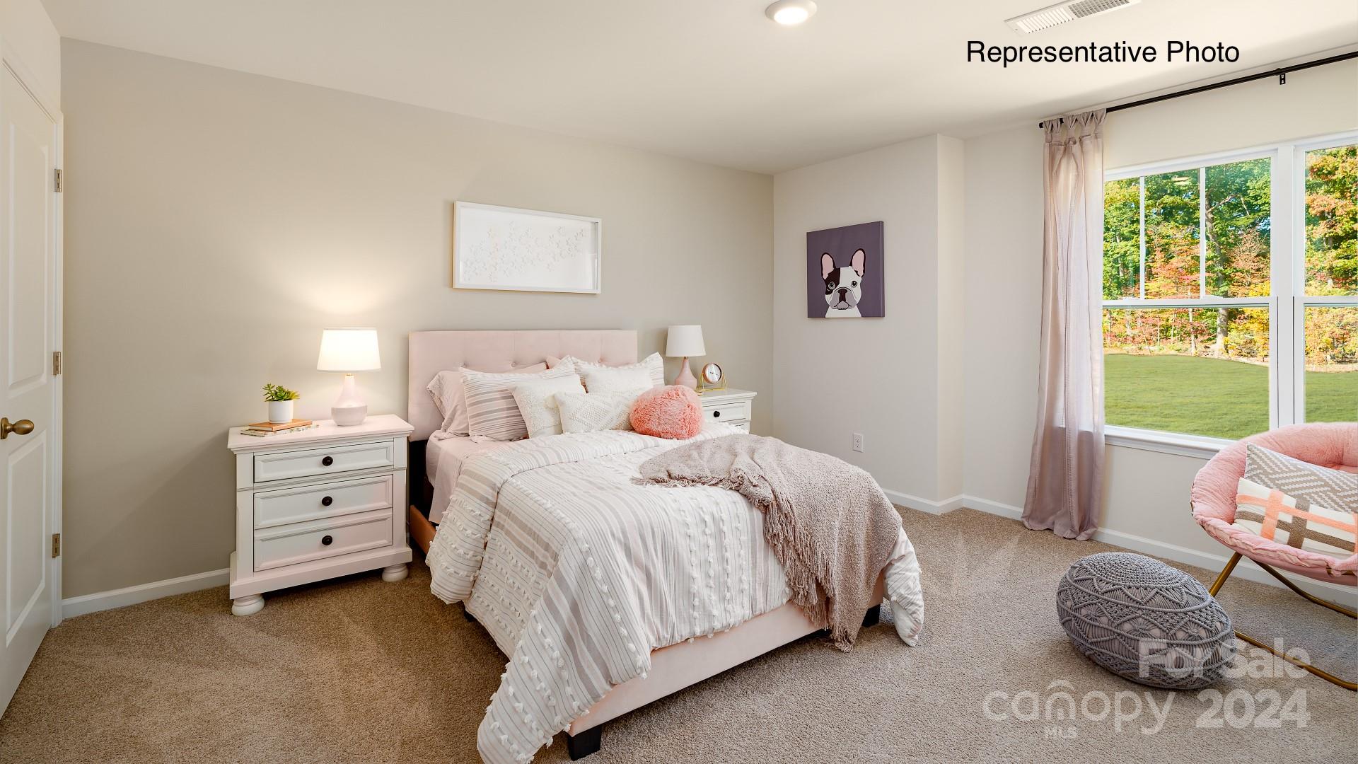 7922 Old Brk Road Sherrills Ford, NC 28673 - Photo 21 of 32 a bedroom with a bed and a window