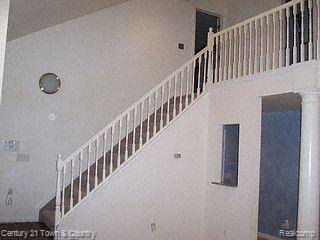 2869 Hartline Drive Rochester, MI 48309 - Photo 4 of 8 Stairway to Upper Level
