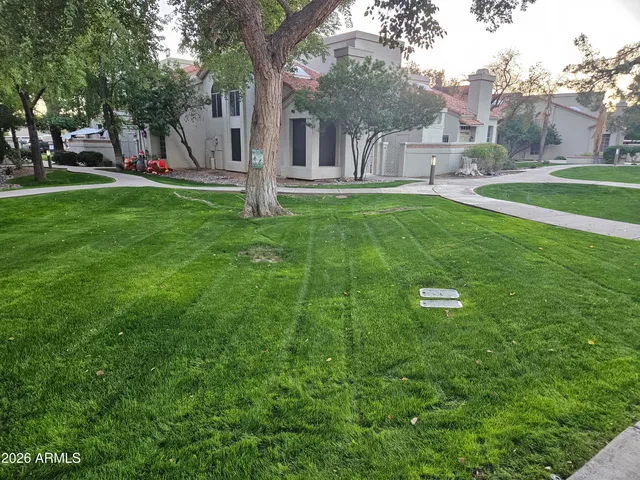 a view of a hallway with staircase