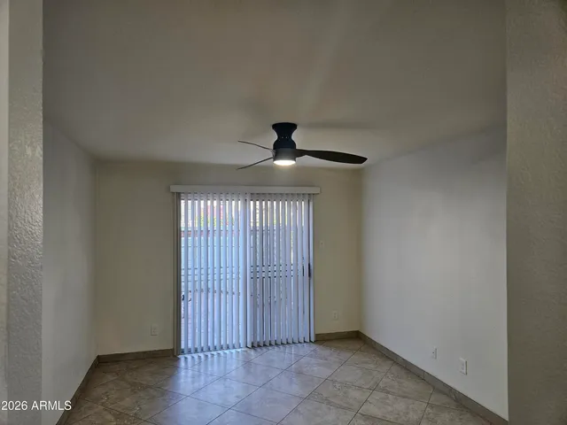 a view of a big room with carpet