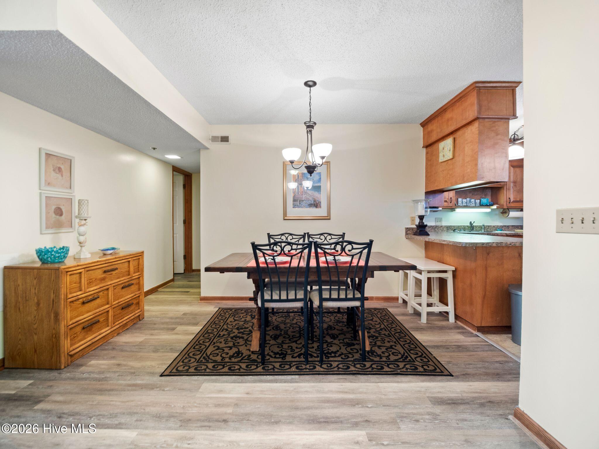1896 New River Inlet Road, Unit 1119 North Topsail Beach, NC 28460 - Photo 11 of 39 Dining Area