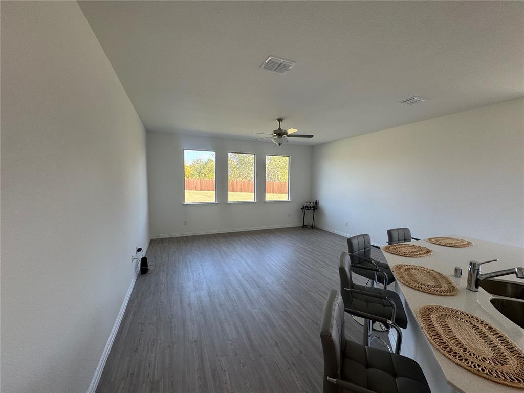4905 Sagerun Drive Princeton, TX 75407 - Photo 14 of 25 a view of a workspace with furniture and a window