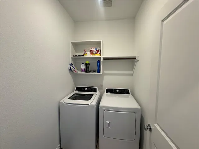 a room with storage and utility