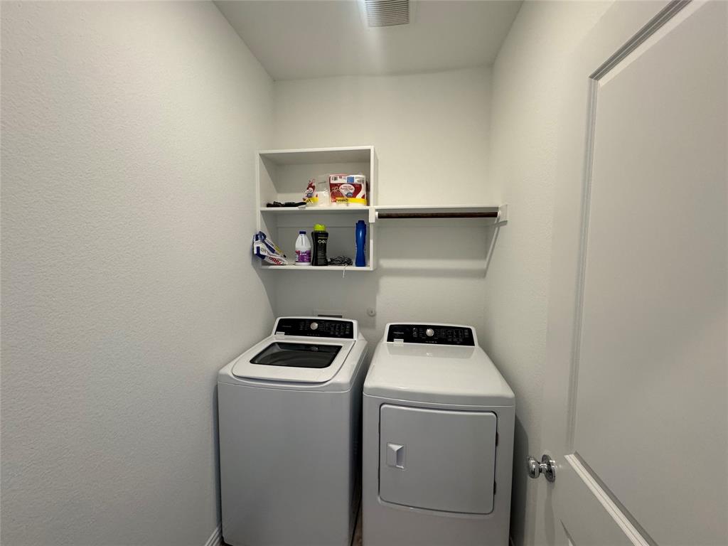 4905 Sagerun Drive Princeton, TX 75407 - Photo 19 of 25 a room with storage and utility