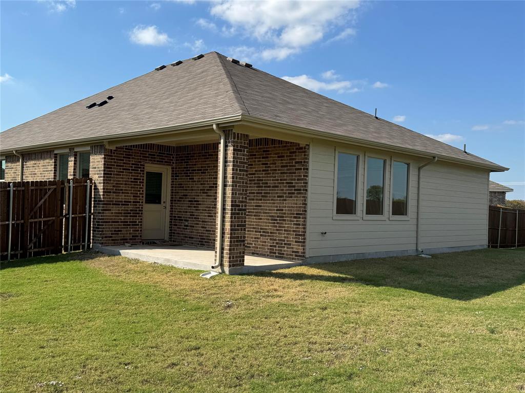 4905 Sagerun Drive Princeton, TX 75407 - Photo 22 of 25 a view of a house with backyard