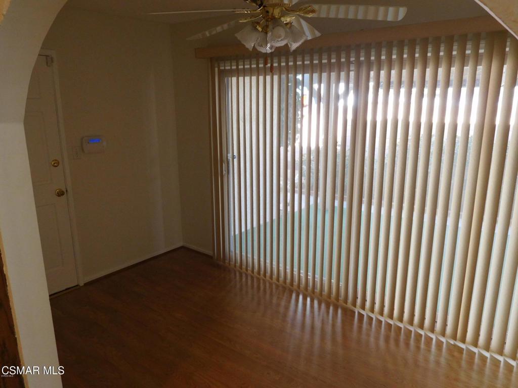 1394 Sycamore Drive Simi Valley, CA 93065 - Photo 5 of 13 a view of an empty room with a window