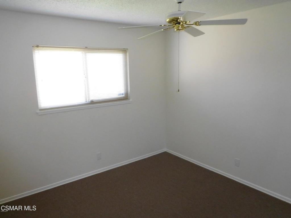 1394 Sycamore Drive Simi Valley, CA 93065 - Photo 7 of 13 an empty room with a window