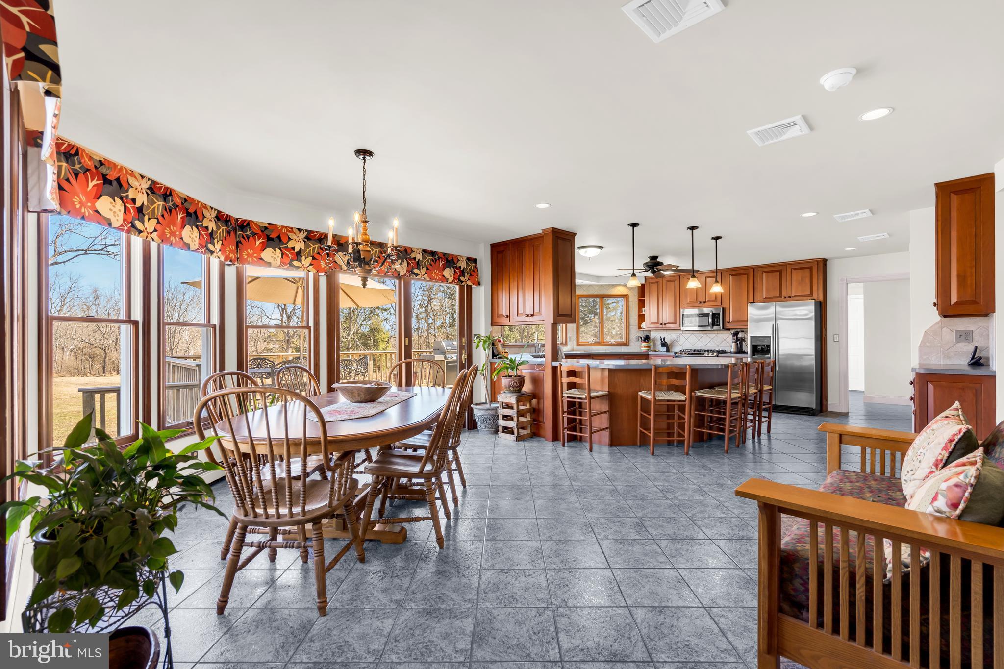 309 Pennington Harbourton Road Pennington, NJ 08534 - Photo 13 of 67 a view of a dining room with furniture window and outside view