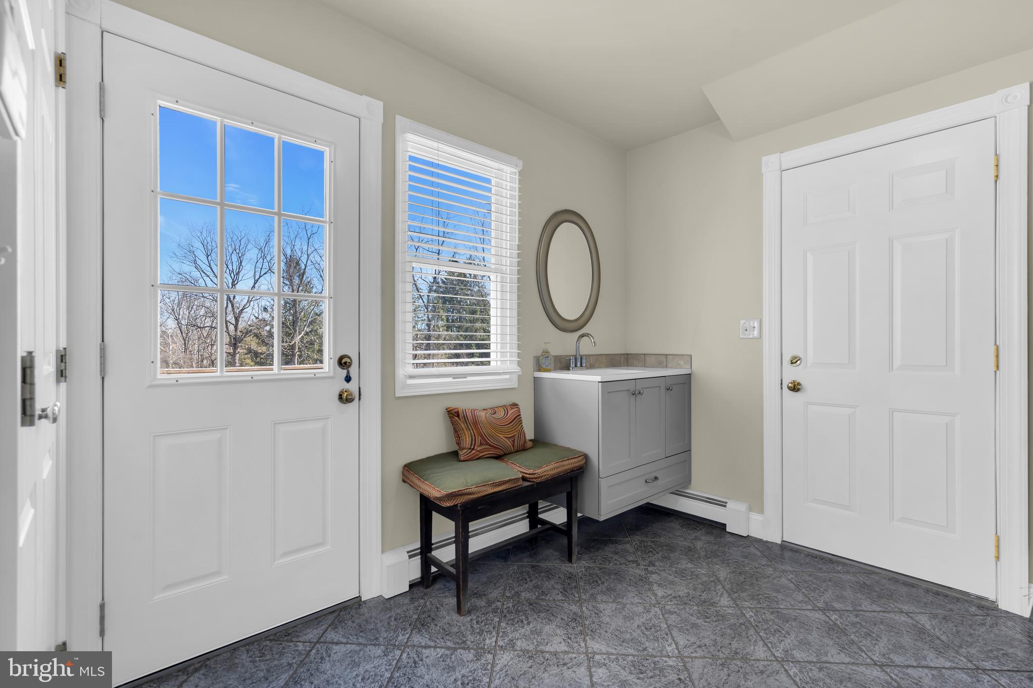 309 Pennington Harbourton Road Pennington, NJ 08534 - Photo 19 of 67 a living room with furniture a window and a potted plant