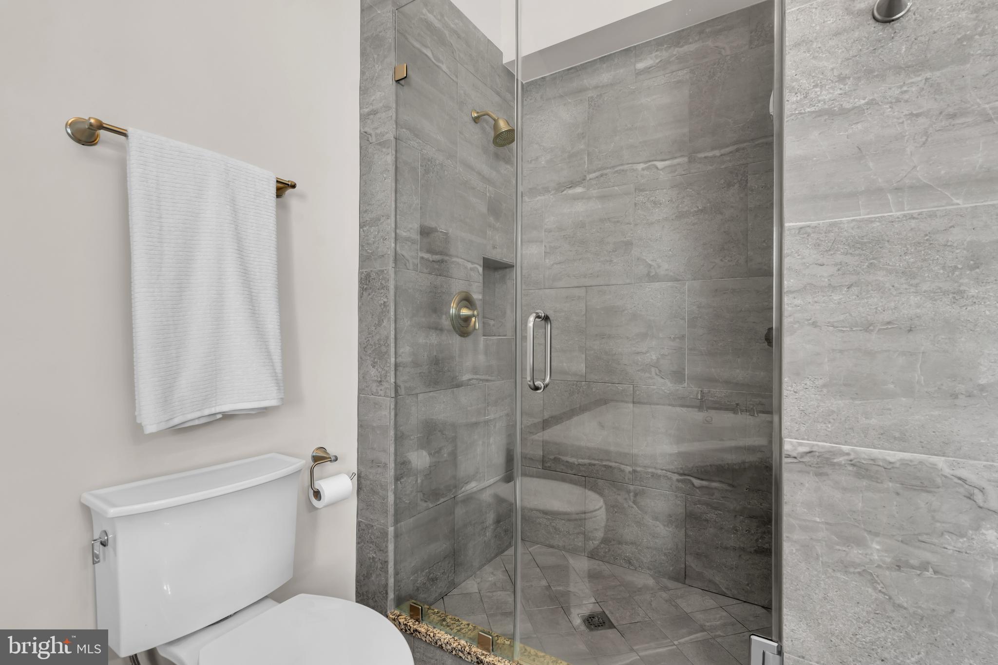 309 Pennington Harbourton Road Pennington, NJ 08534 - Photo 25 of 67 a bathroom with a shower and toilet