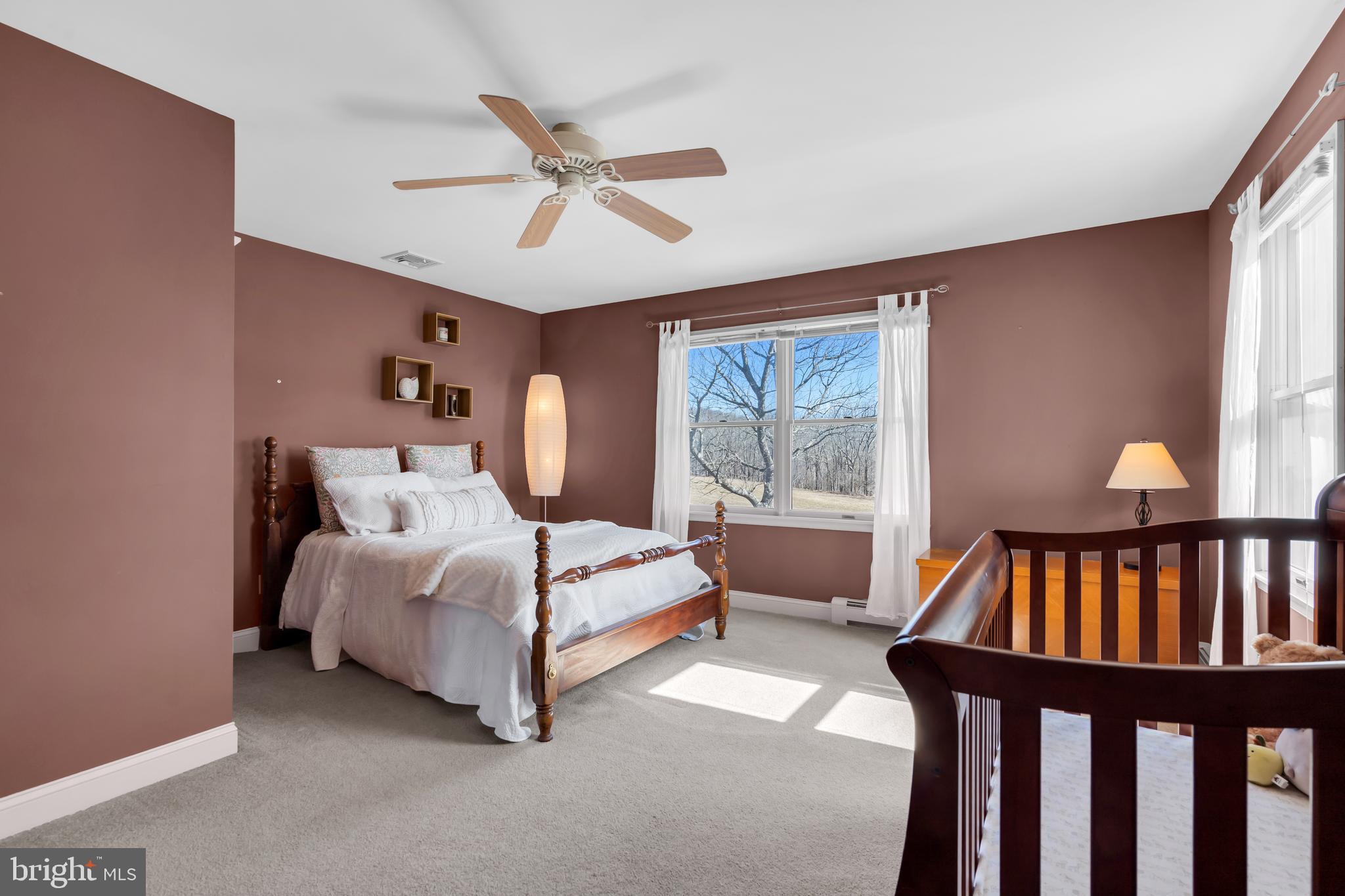 309 Pennington Harbourton Road Pennington, NJ 08534 - Photo 27 of 67 a bedroom with a bed and a window