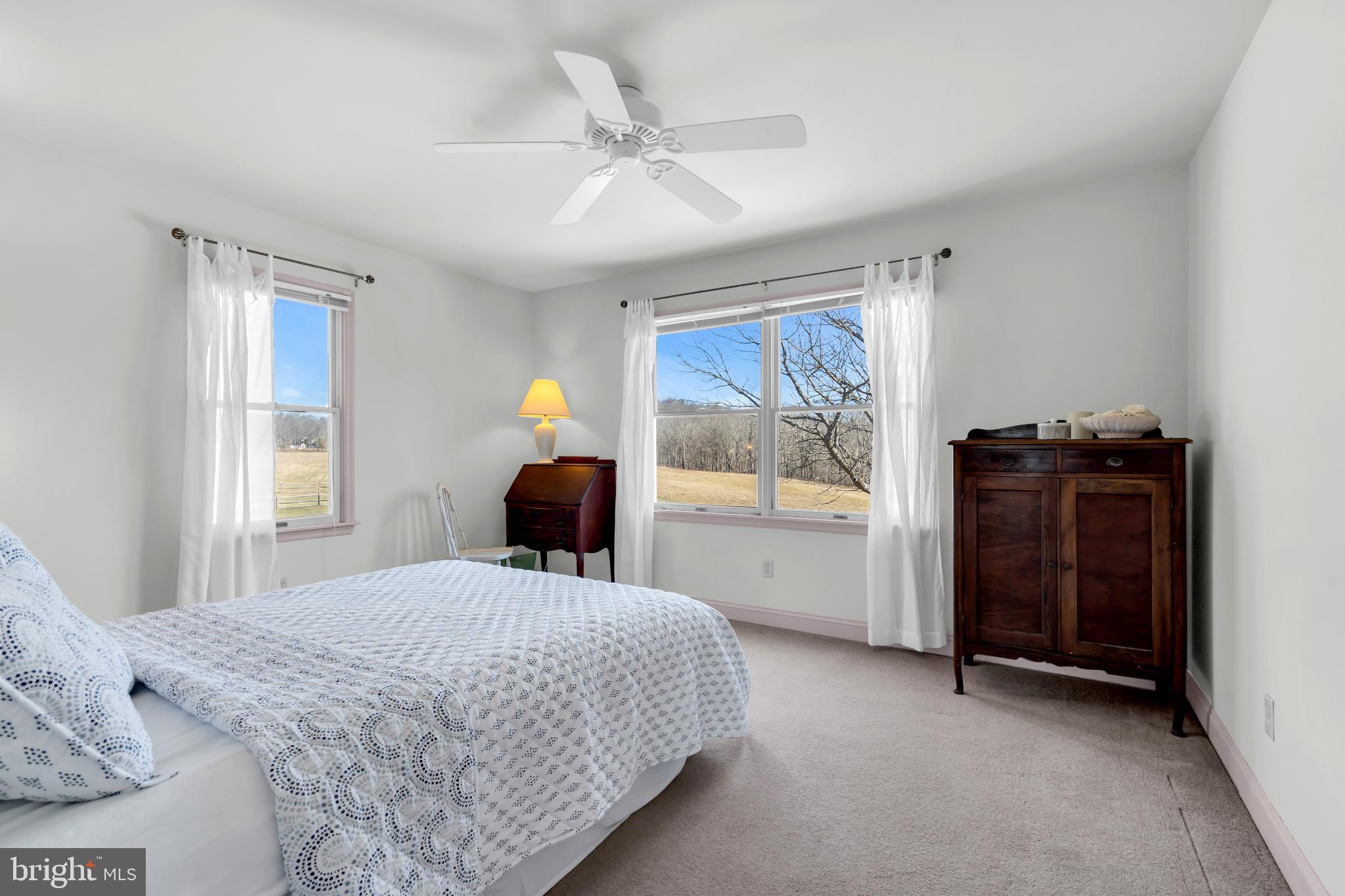 309 Pennington Harbourton Road Pennington, NJ 08534 - Photo 30 of 67 a bedroom with a bed and a dresser next to a window