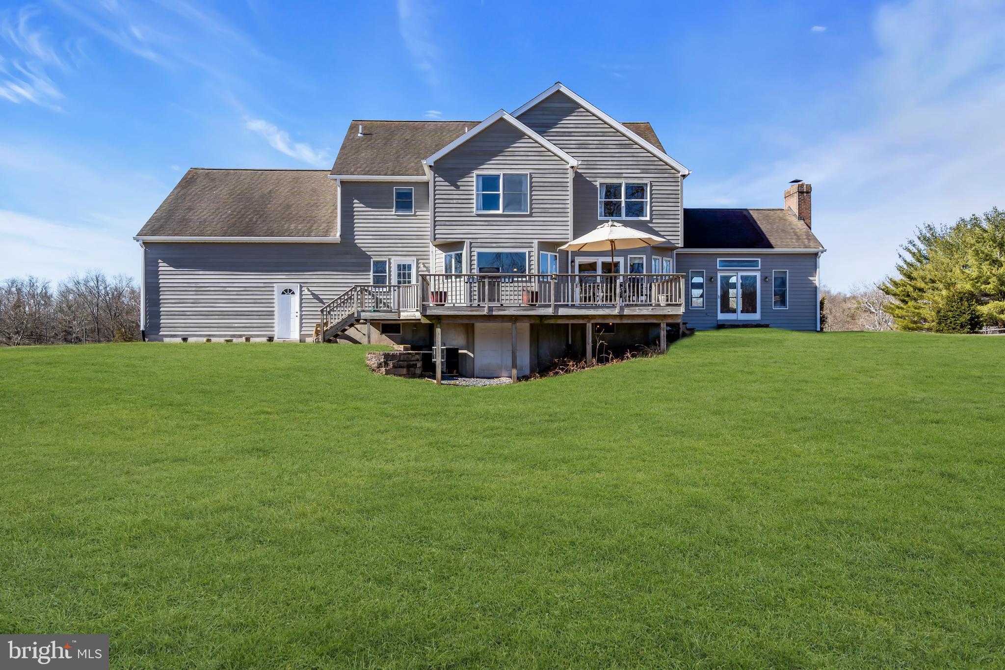 309 Pennington Harbourton Road Pennington, NJ 08534 - Photo 43 of 67 a front view of house with yard and green space