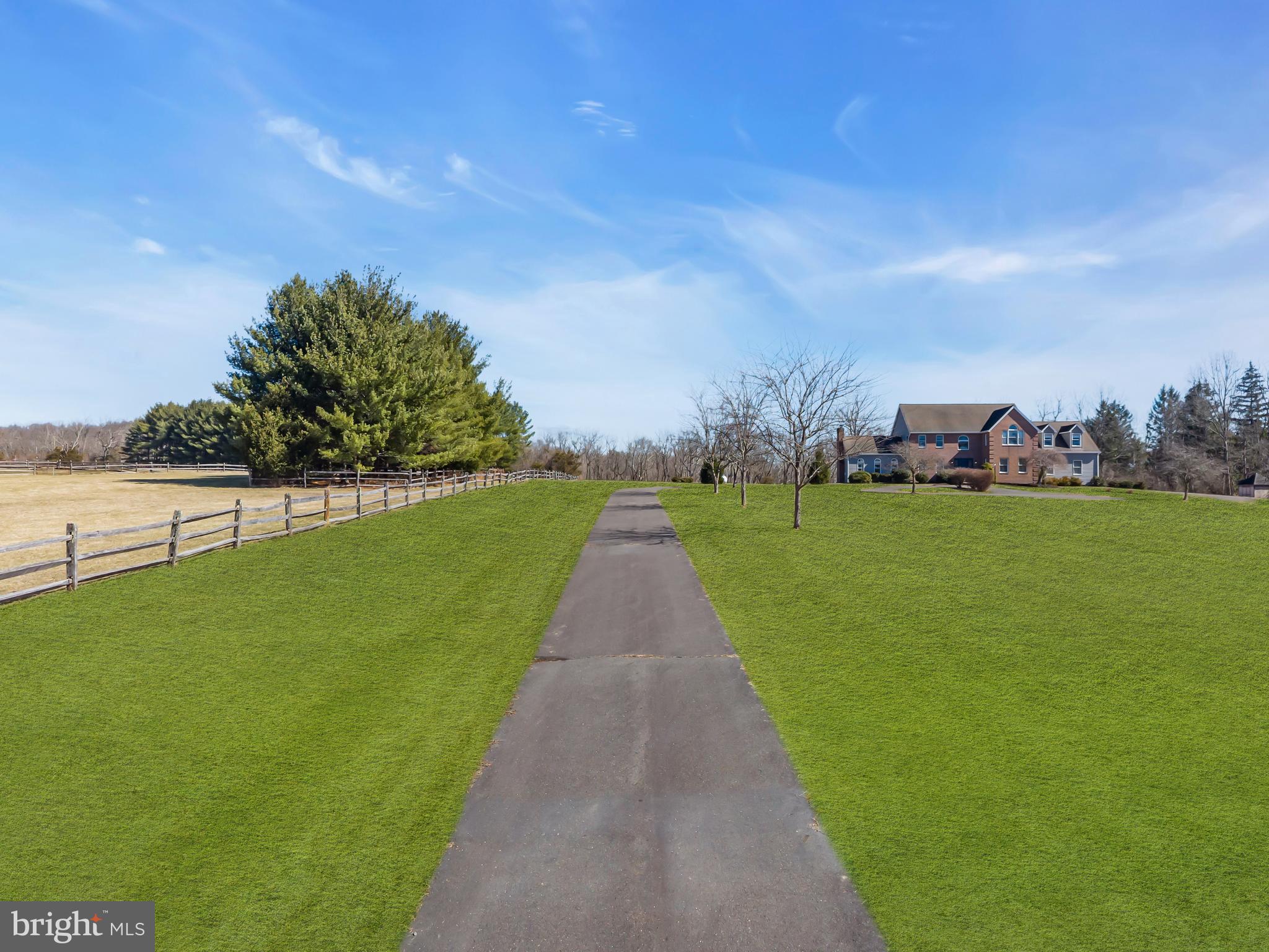309 Pennington Harbourton Road Pennington, NJ 08534 - Photo 48 of 67 a view of a pathway both side of grassy field with shrub