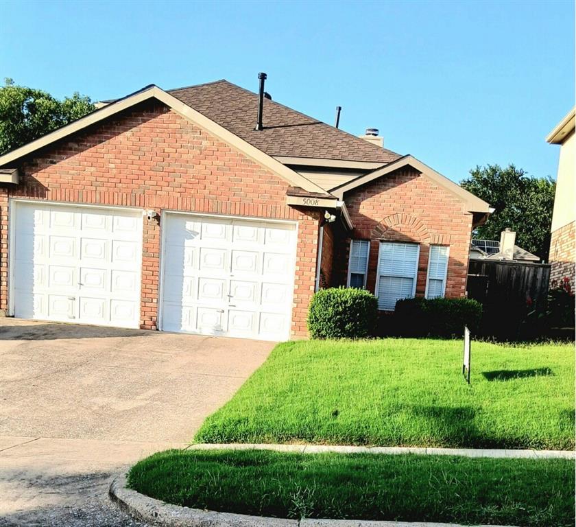 5008 Bay View Garland, TX 75043 - Photo 1 of 1 Ranch-style house with an attached garage, driveway, brick siding, a front lawn, and a shingled roof