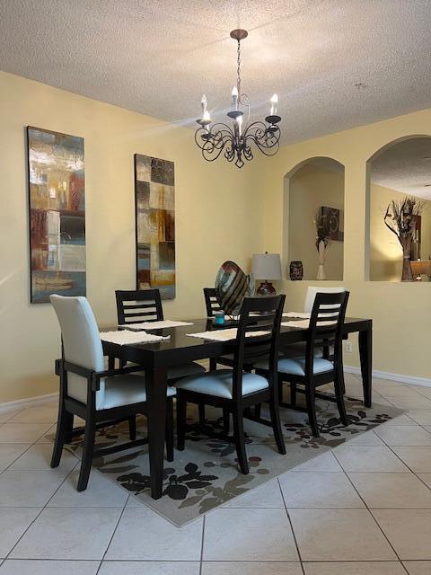 106 Lighthouse Circle, Unit G Tequesta, FL 33469 - Photo 14 of 34 a view of a dining room with furniture