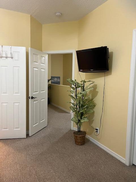 106 Lighthouse Circle, Unit G Tequesta, FL 33469 - Photo 22 of 34 a living room with furniture and a flat screen tv