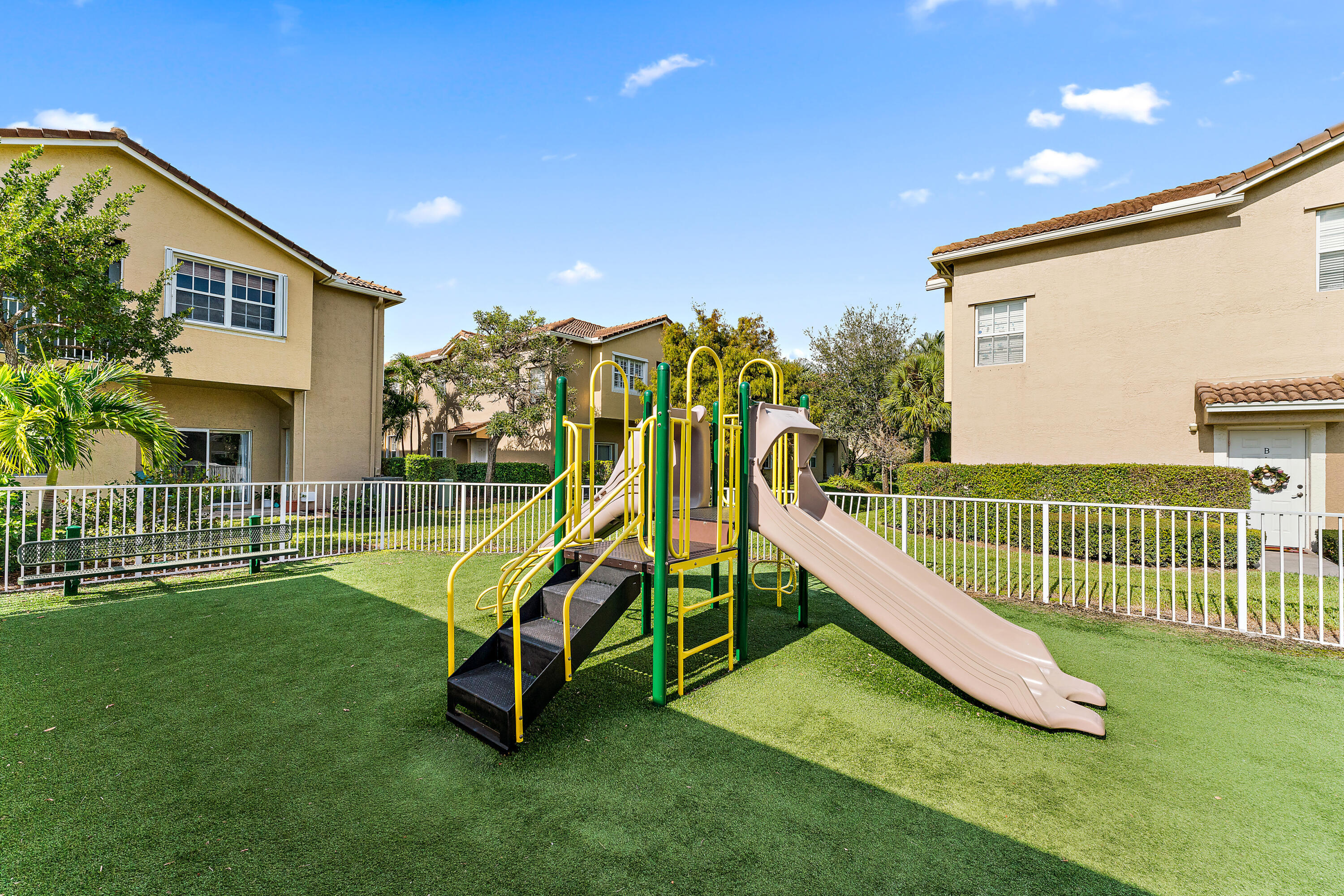 106 Lighthouse Circle, Unit G Tequesta, FL 33469 - Photo 3 of 34 a view of a house with a park