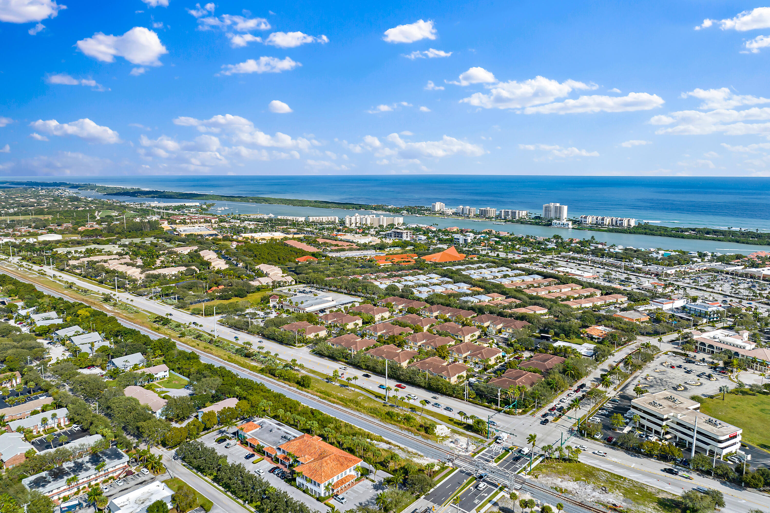106 Lighthouse Circle, Unit G Tequesta, FL 33469 - Photo 9 of 34 an aerial view of residential building with outdoor space