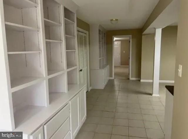 2104 Grey Fox Court, Unit BASEMENT APARTMENT Gambrills, MD 21054 - Photo 5 of 12 Spacious hallway with built-in shelving.