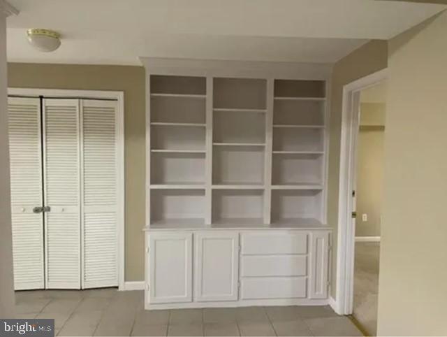 2104 Grey Fox Court, Unit BASEMENT APARTMENT Gambrills, MD 21054 - Photo 6 of 12 Bright and airy space with built-in shelving.