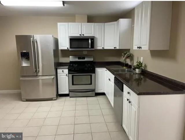 2104 Grey Fox Court, Unit BASEMENT APARTMENT Gambrills, MD 21054 - Photo 7 of 12 Modern kitchen with sleek appliances.