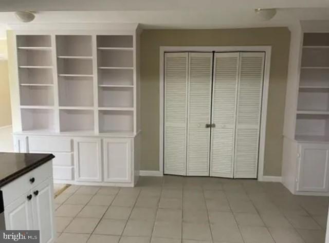 2104 Grey Fox Court, Unit BASEMENT APARTMENT Gambrills, MD 21054 - Photo 8 of 12 Spacious room with elegant built-ins.