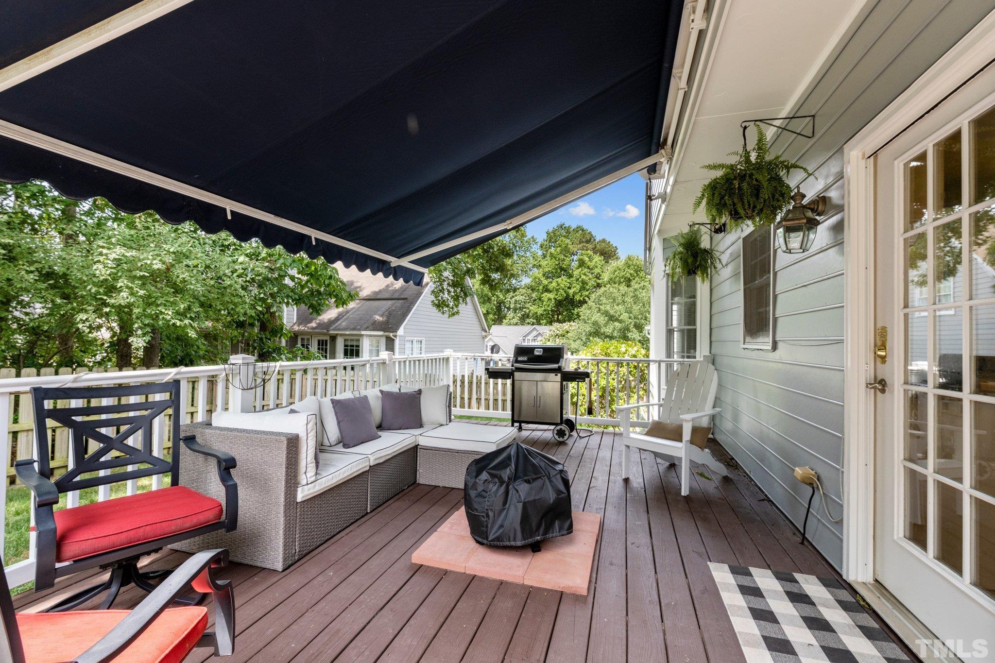 5217 Denmead Way Raleigh, NC 27613 - Photo 5 of 30 a view of balcony with furniture and wooden floor