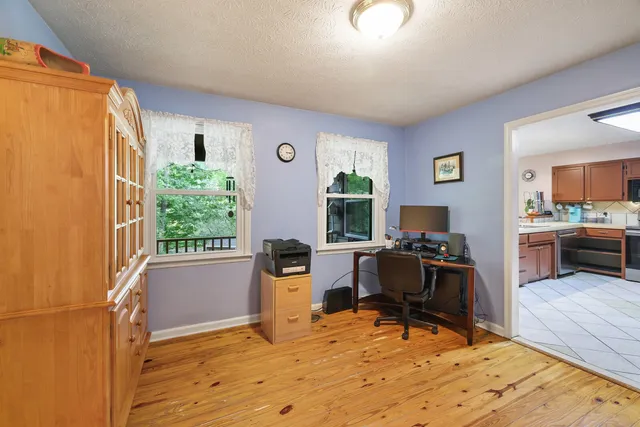 a kitchen with stainless steel appliances a sink stove and refrigerator