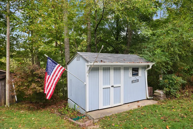 a picture of a refrigerator with white cabinets