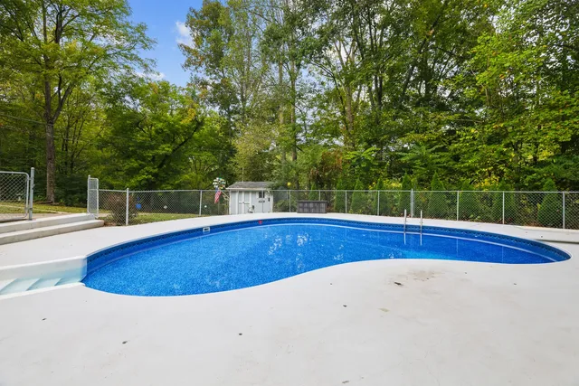 a view of outdoor space and swimming pool