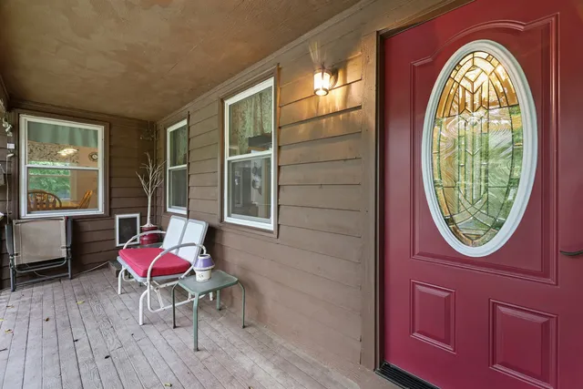 a workspace with furniture and window