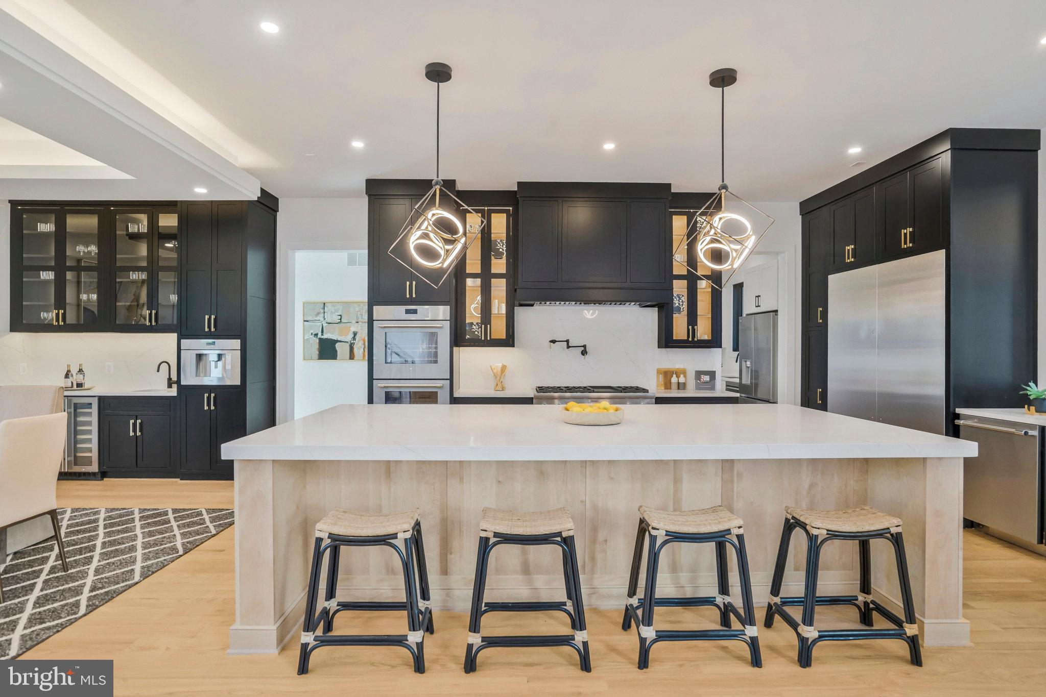 1520 Brookhaven Drive McLean, VA 22101 - Photo 28 of 108 Pendant lights over kitchen island