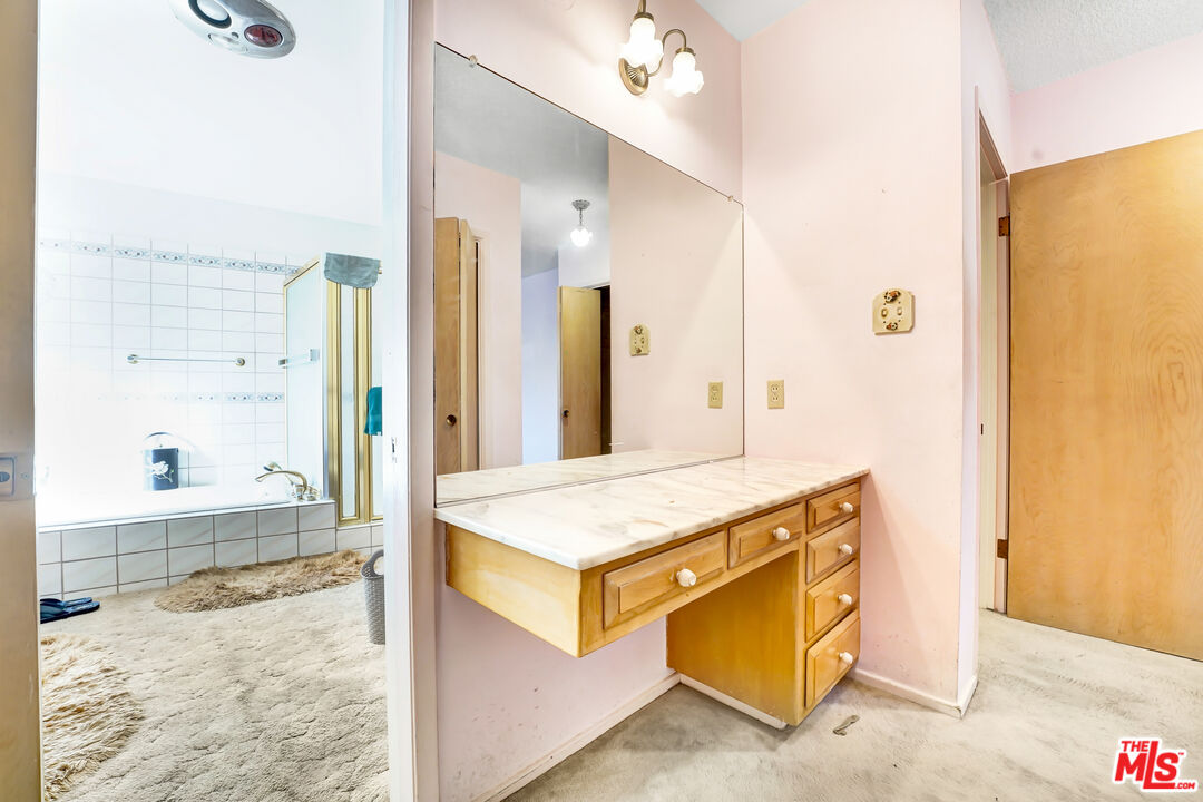 6424 Shenandoah Avenue Los Angeles, CA 90056 - Photo 11 of 35 a living room with a stove and a refrigerator