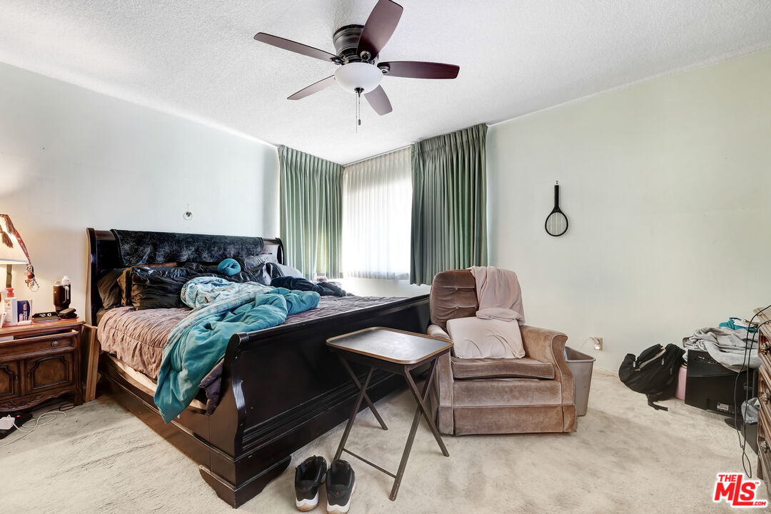 6424 Shenandoah Avenue Los Angeles, CA 90056 - Photo 16 of 35 a bedroom with a bed and window