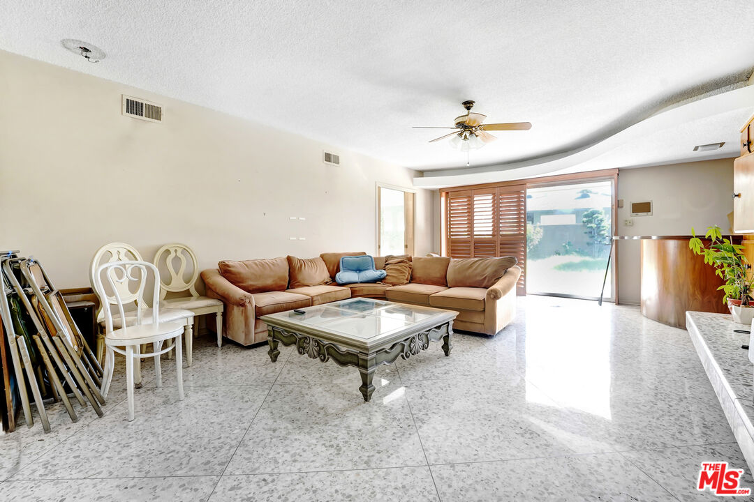 6424 Shenandoah Avenue Los Angeles, CA 90056 - Photo 18 of 35 a living room with furniture and a window