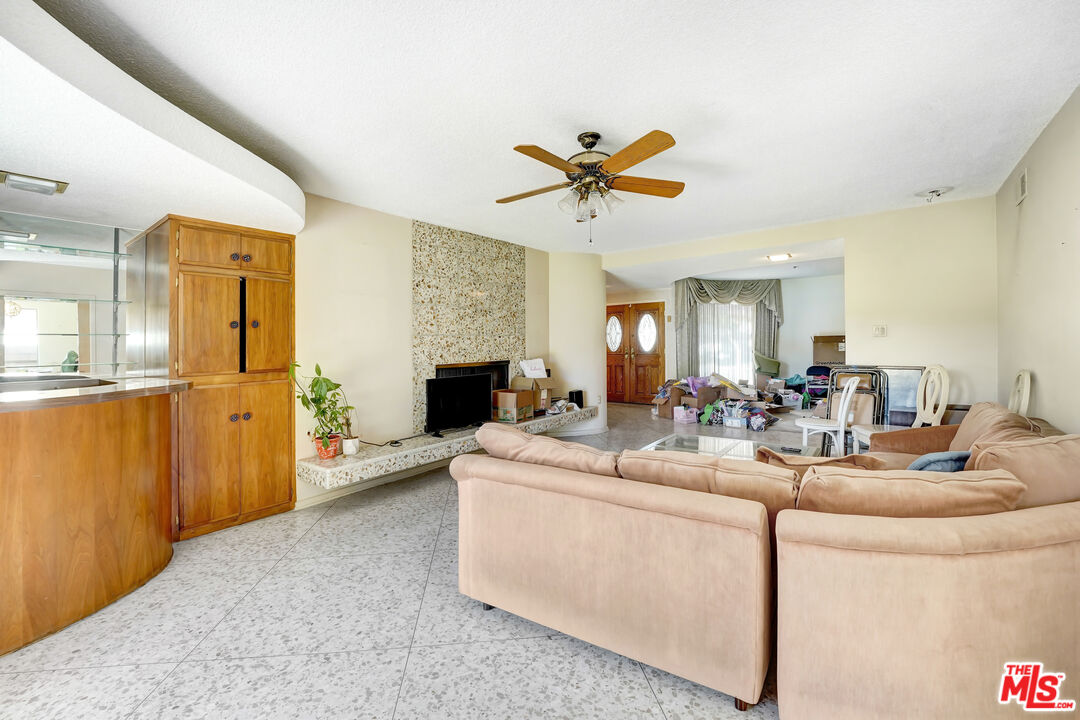6424 Shenandoah Avenue Los Angeles, CA 90056 - Photo 19 of 35 a living room with furniture and a wooden floor