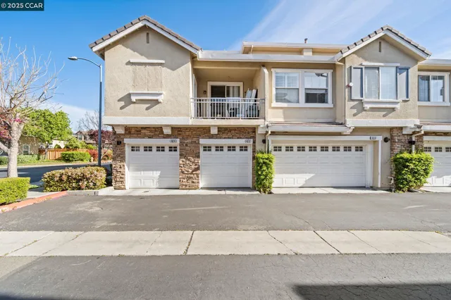 a front view of a building with street