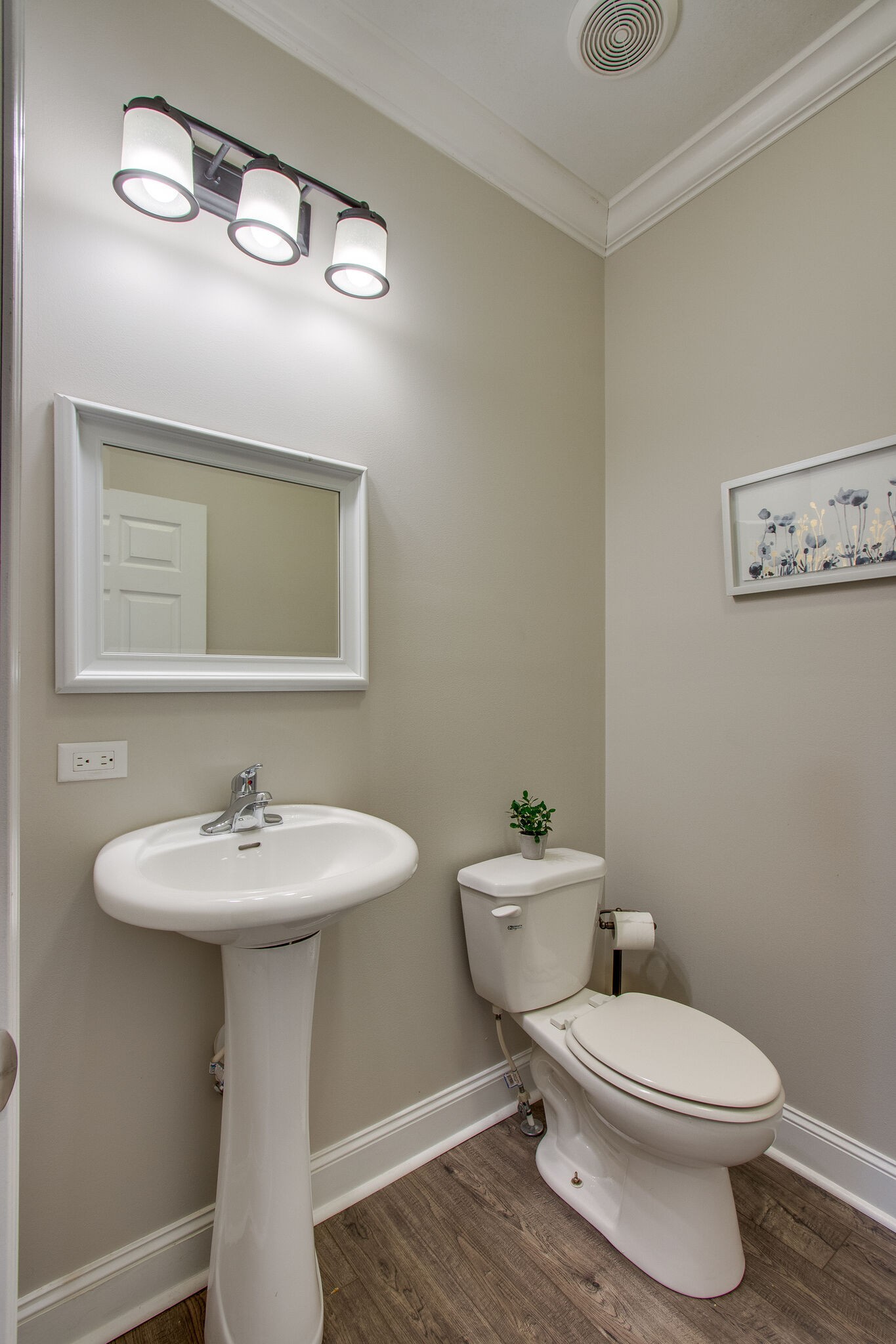 1164 Wrights Mill Road Spring Hill, TN 37174 - Photo 21 of 30 a bathroom with a toilet sink and mirror