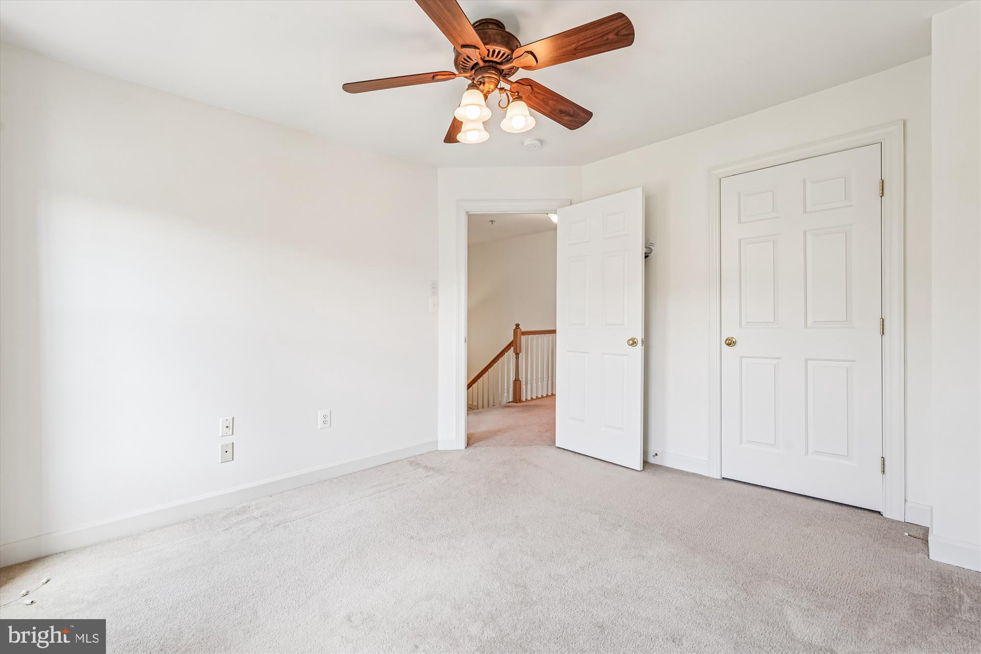 142 Swanton Lane Gaithersburg, MD 20878 - Photo 32 of 68 an empty room with a ceiling fan and a window