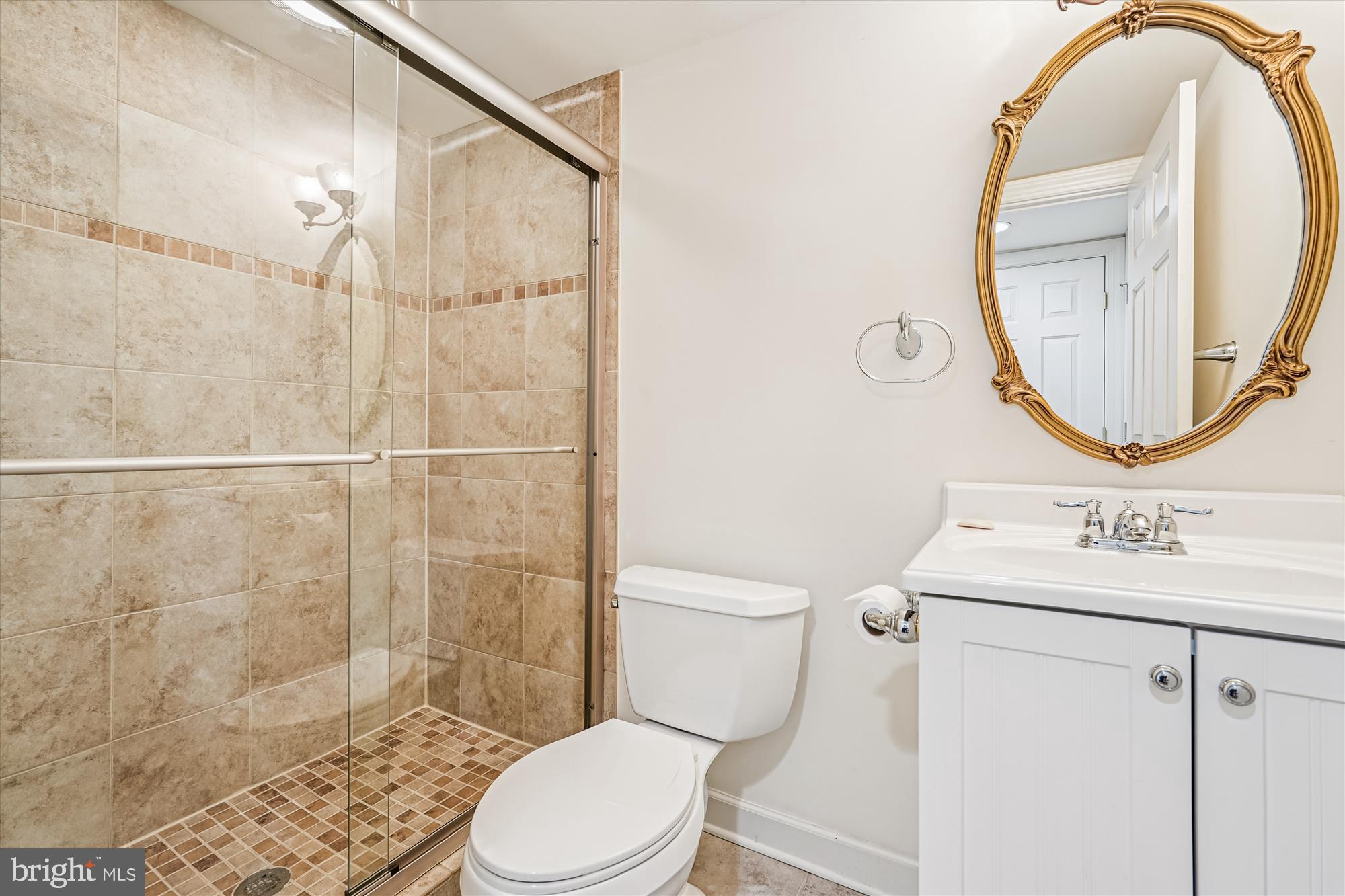 142 Swanton Lane Gaithersburg, MD 20878 - Photo 43 of 68 a bathroom with a sink toilet and shower