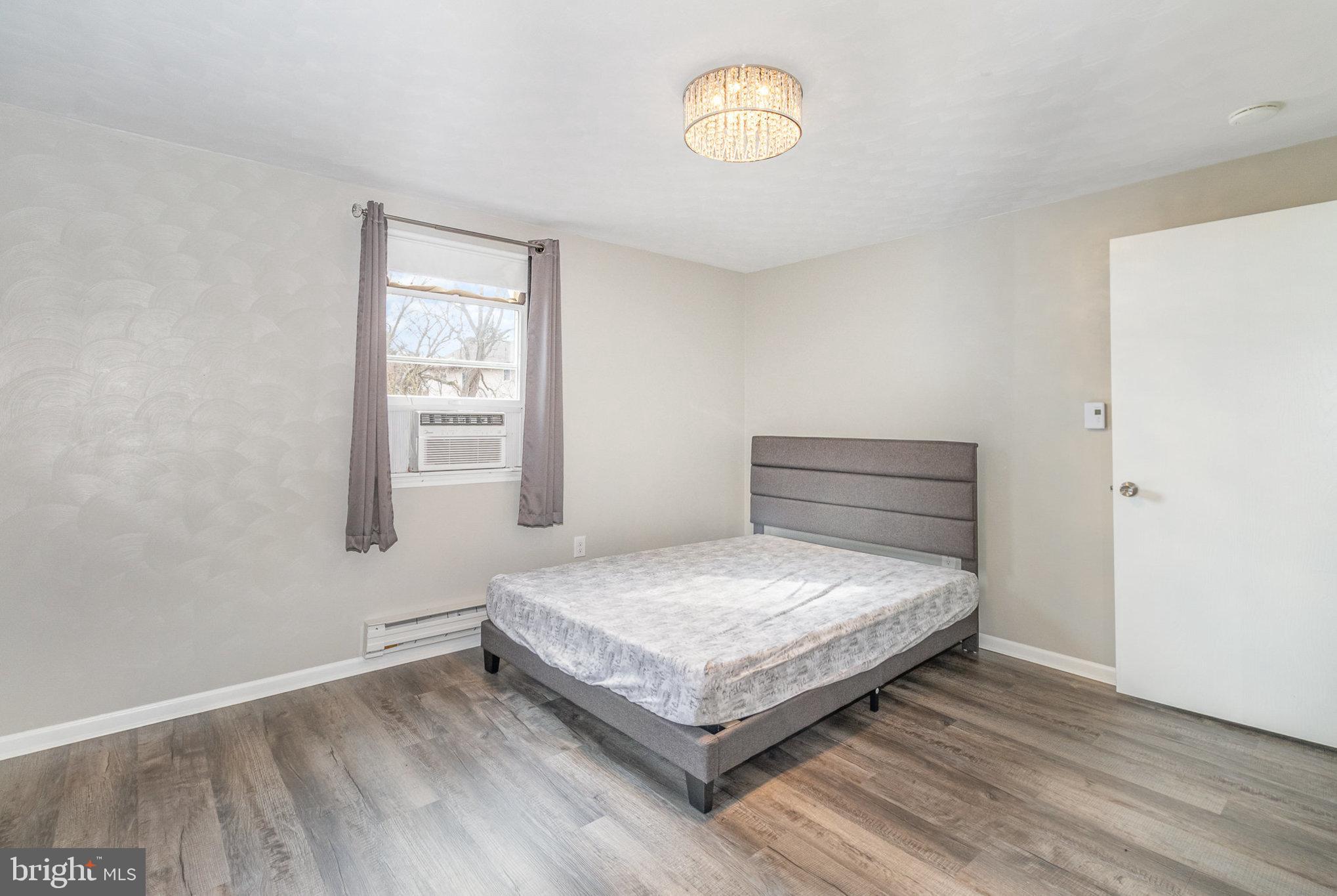 15 Penn Circle Hanover, PA 17331 - Photo 14 of 32 a bedroom with a bed and a window